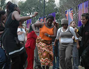 Zimbabwean women took time out to show off their dancing skills, while the men took care of the babies.