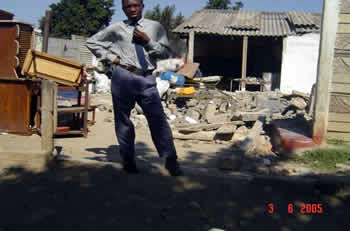Back from school and only to find the house he used to sleep in destroyed in Mbare