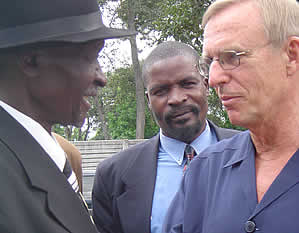 Headman Zihute (left) shares a joke with Sten Raylander, Swedish Ambassador to Zimbabwe during the handover ceremony.