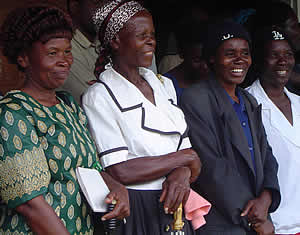 Murehwa women admire the traditional dances by the school children.