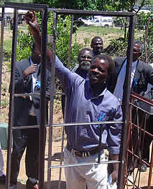 A lecture from Chikuku explains to officials the door frames are made 