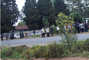 Go home! Zimbabwe's riot police disperse supporters of the MDC from attending a rally in Highfield. The MDC had been secured a court order from the High Court to go ahead with the rally but the police ignored this order. © LAZELE 
