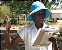 School girl conducting water tests