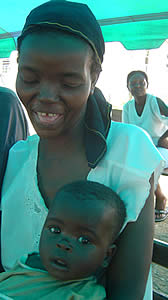 Lucia Tsvangira and her six-month baby Chido