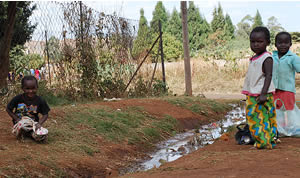 Children by flowing sewerage
