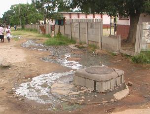 Lids on the manholes in the streets are lifting and raw human excrement is flowing out of them