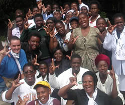WOZA women show their 'love' sign - pic from WOZA archives