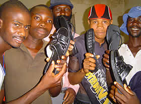 Some of the youth who are learning how to make shoes, sandalsand handbags at Dzidzai Women's Technical College