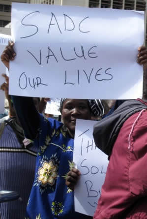 Poster reads: "SADC value our lives"